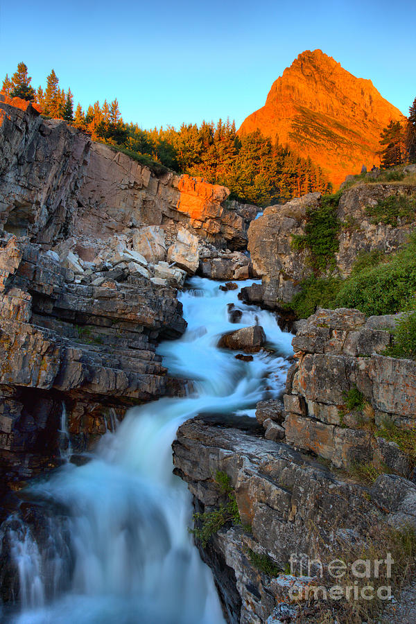 Orange Above Swiftcurrent Falls Photograph by Adam Jewell