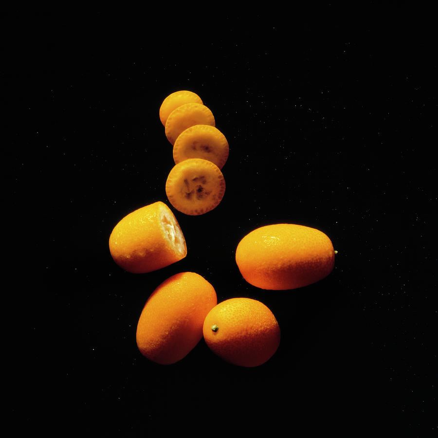 Citrus Fruit on Black Velvet Photograph by Kim Lessel