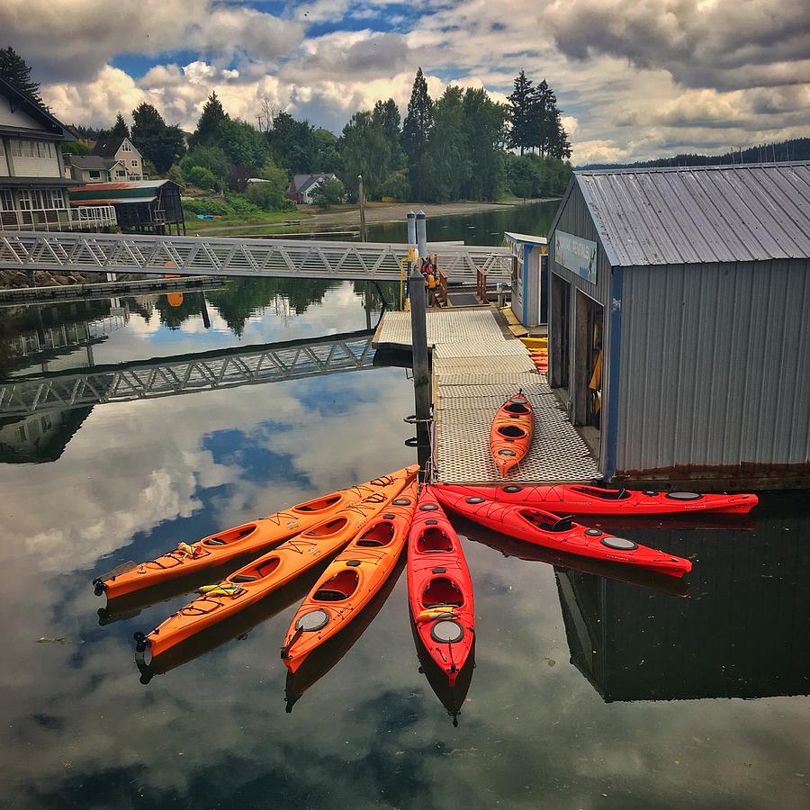 Orange Kayaks Photograph by Jerry Abbott