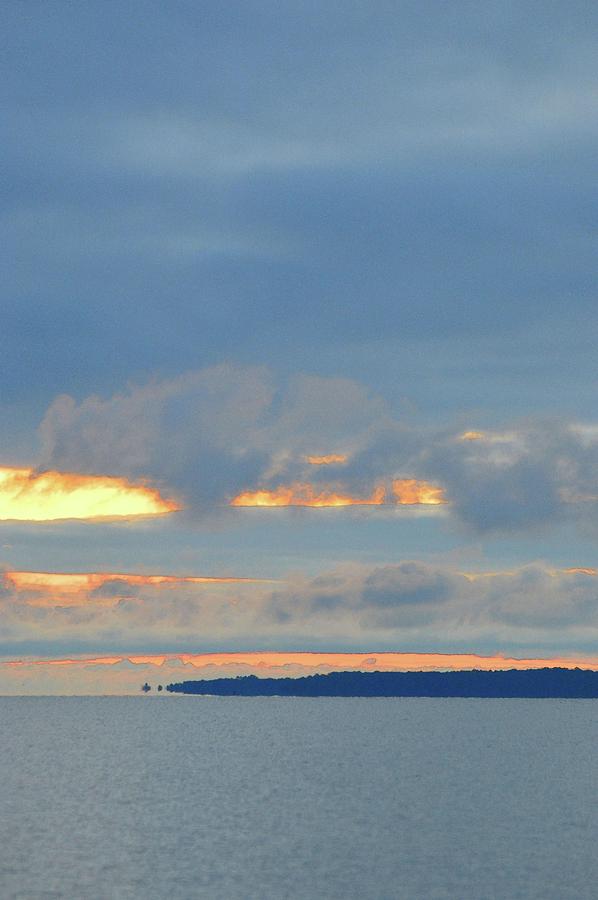 Orange Sky Over A Distant Shore  Photograph by Lyle Crump