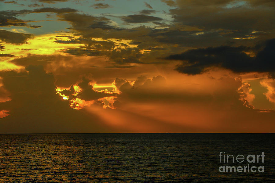Orange Sun Rays Photograph by Tom Claud
