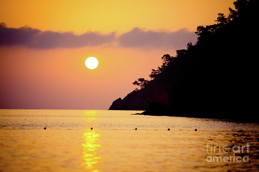 Orange sunrise above sea Photograph by Raimond Klavins