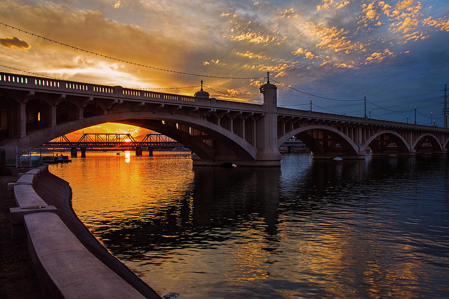 Orange sunset over Tempe Town Lake Photograph by Dave Dilli