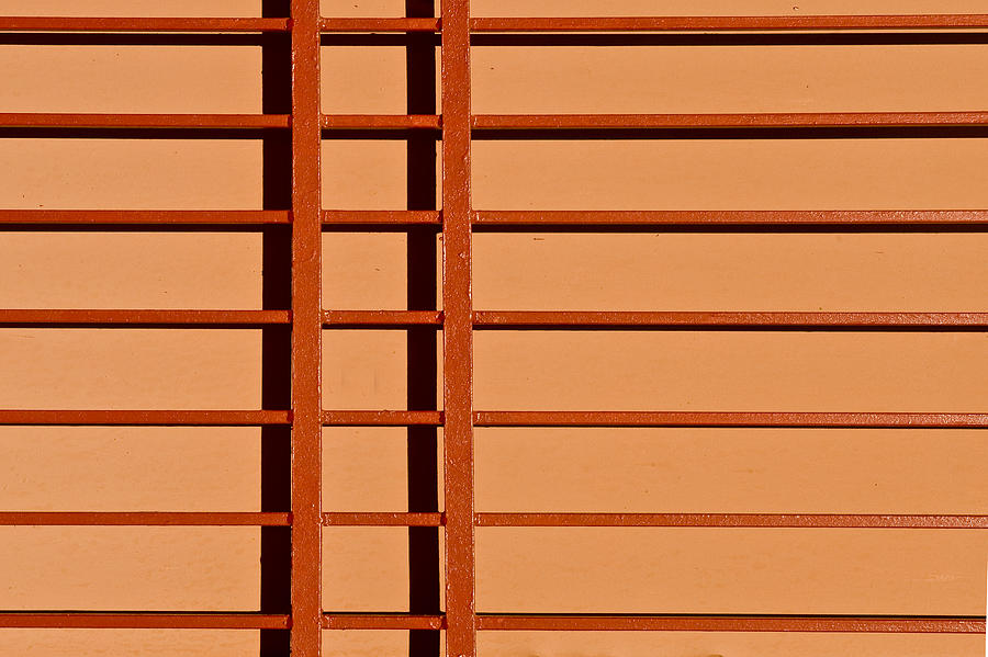 Orange wall and latisse work architectural  detail Photograph by Gary Warnimont