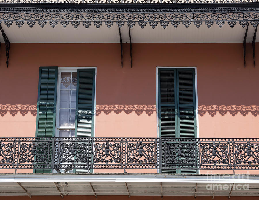 Ornate balcony in New Orleans Photograph by Louise Heusinkveld