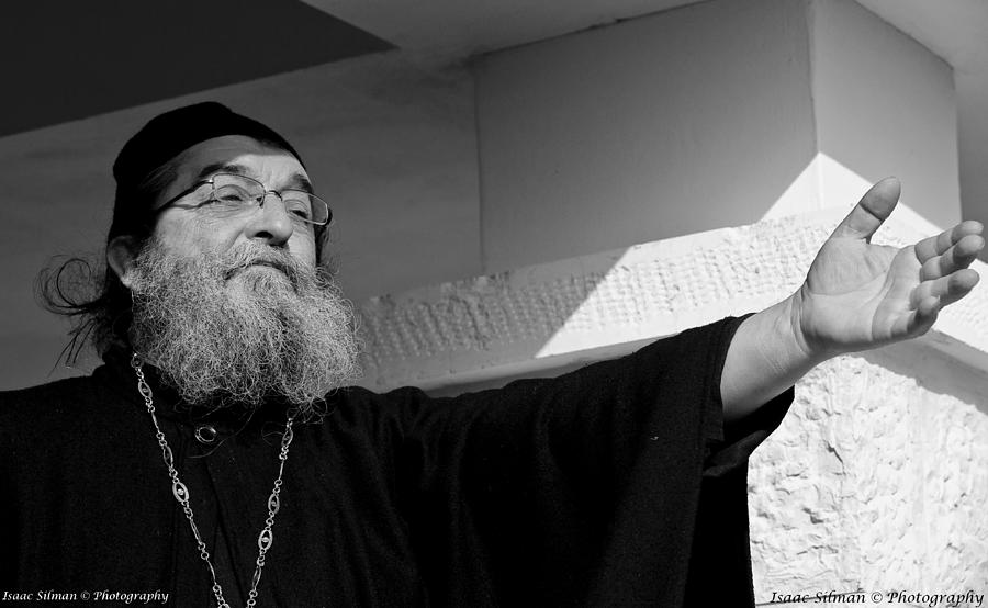Orthodox priest Shows the way Photograph by Isaac Silman