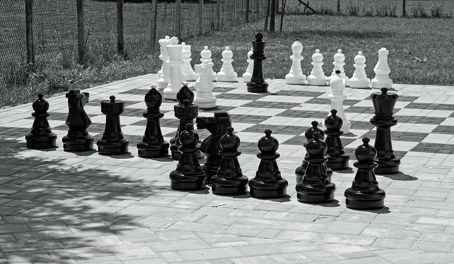 Outdoor Chess game Black and White Photograph by Sally Weigand