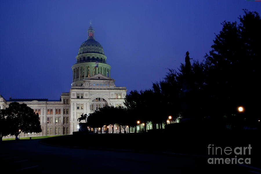 Architecture Photograph - Outlines of the many symbolic statues can be sign at the Texas State Capitol grounds - Stock Image by Dan Herron