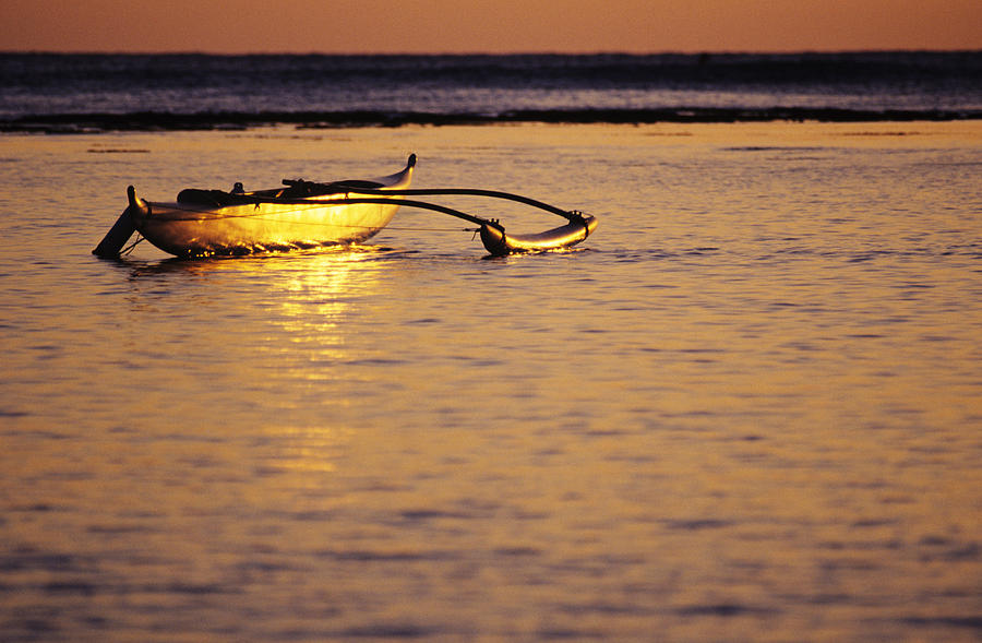 Outrigger and Sunset Photograph by Joss - Printscapes