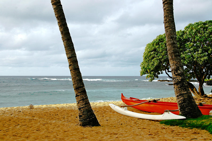 Outrigger Canoe on Beach Photograph by Roger Mullenhour