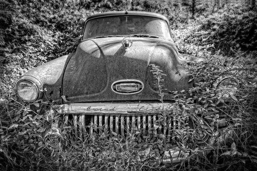 Overgrown Buick Photograph by Alan Raasch