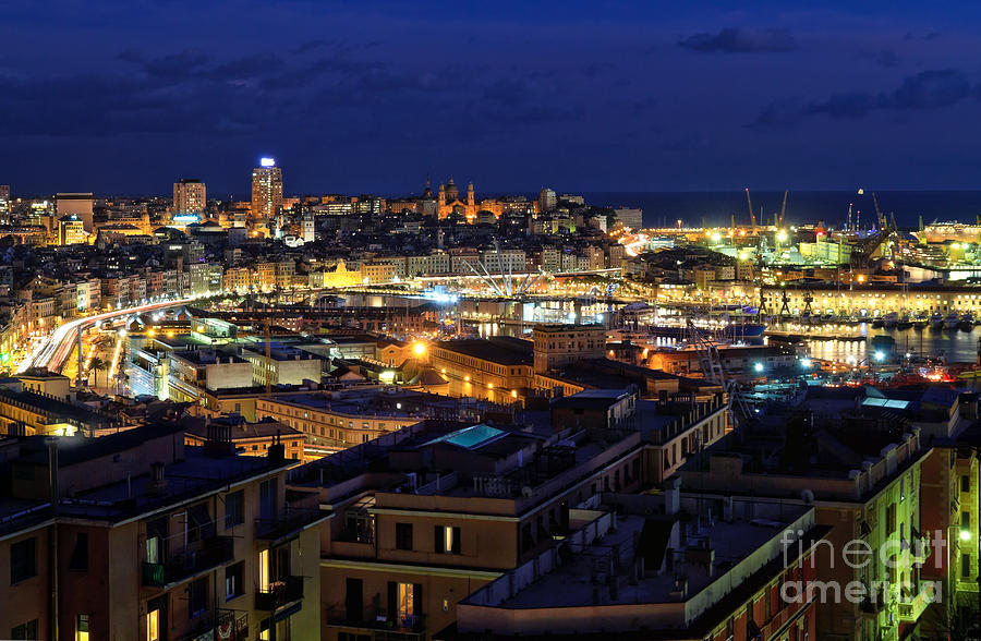 overview of Genoa at evening Photograph by Antonio Scarpi