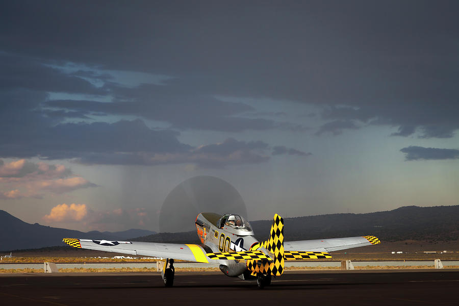 P-51 Mustang and Passing Rain Squall. Photograph by Rick Pisio