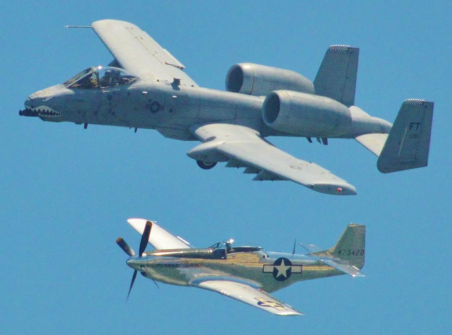P 51D Mustang and A10 Warthog Tank Killer flying over the Atlantic Ocean off the Coast of Ocean City Photograph by Billy Beck