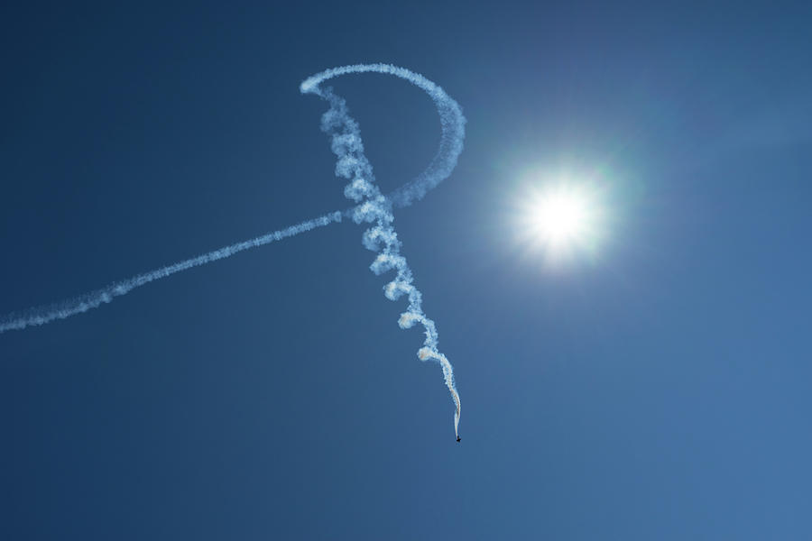P is for Pilot - a Little Airplane Writing on the Sky Photograph by Georgia Mizuleva