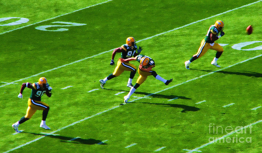Packers Kick Photograph by Clare VanderVeen