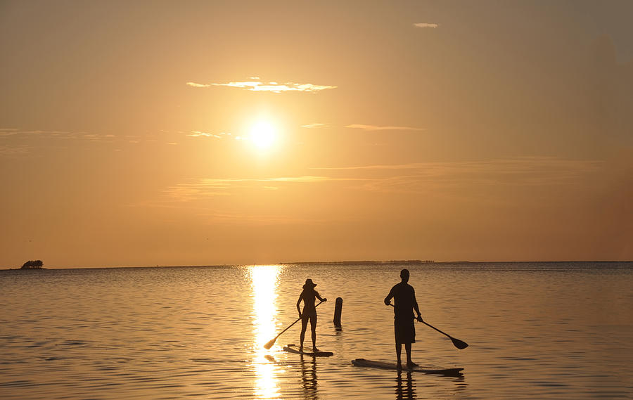 Paddle Boarder Sunset Photograph by Bill Cannon
