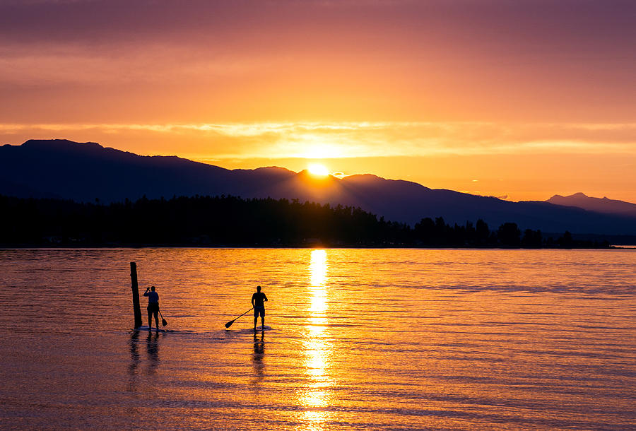 Paddle Boarders Delight Photograph by Wayne Enslow
