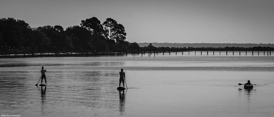 Paddle Boarding Silhouettes  Photograph by Debra Forand