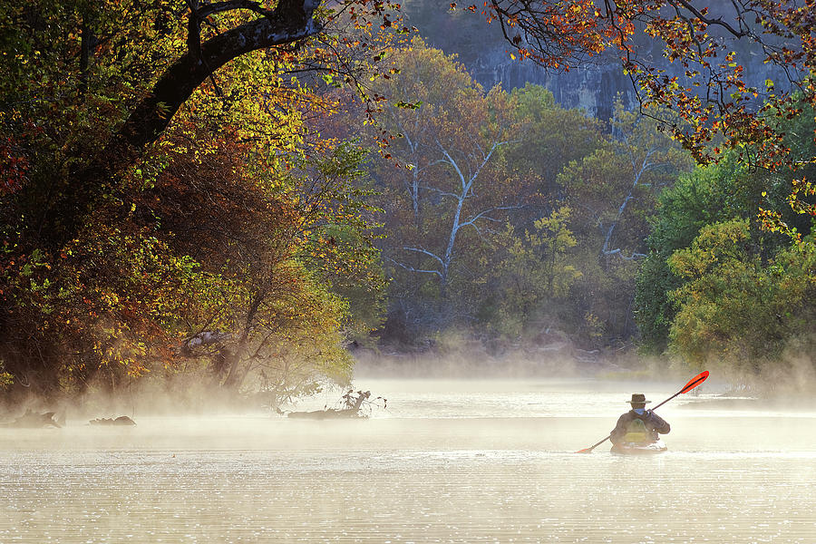 Paddling through Mist Photograph by Robert Charity
