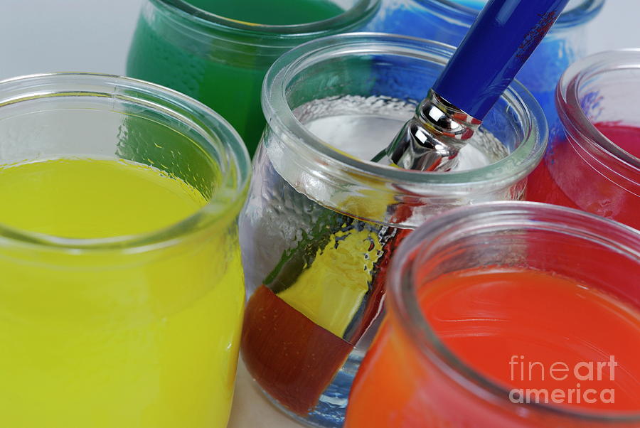 Jar Photograph - Paintbrush in water amongst multi-colored glasses by Sami Sarkis