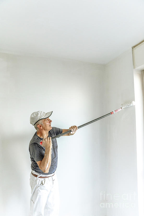 Painting blank wall Photograph by Benny Marty