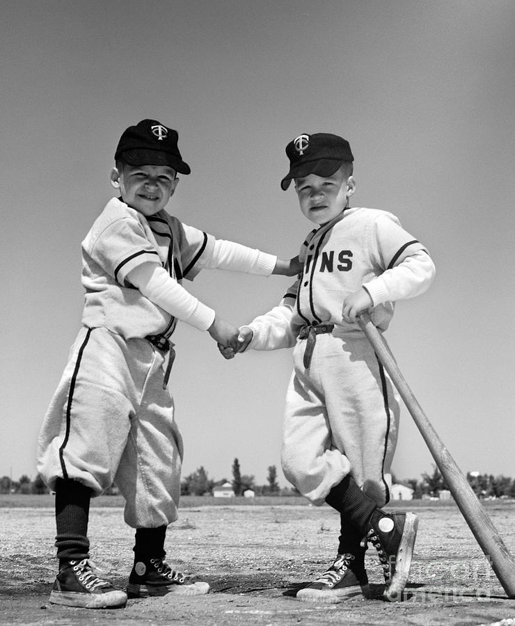 Pair Of Little Leaguers In Uniform Photograph by H. Armstrong Roberts/ClassicStock