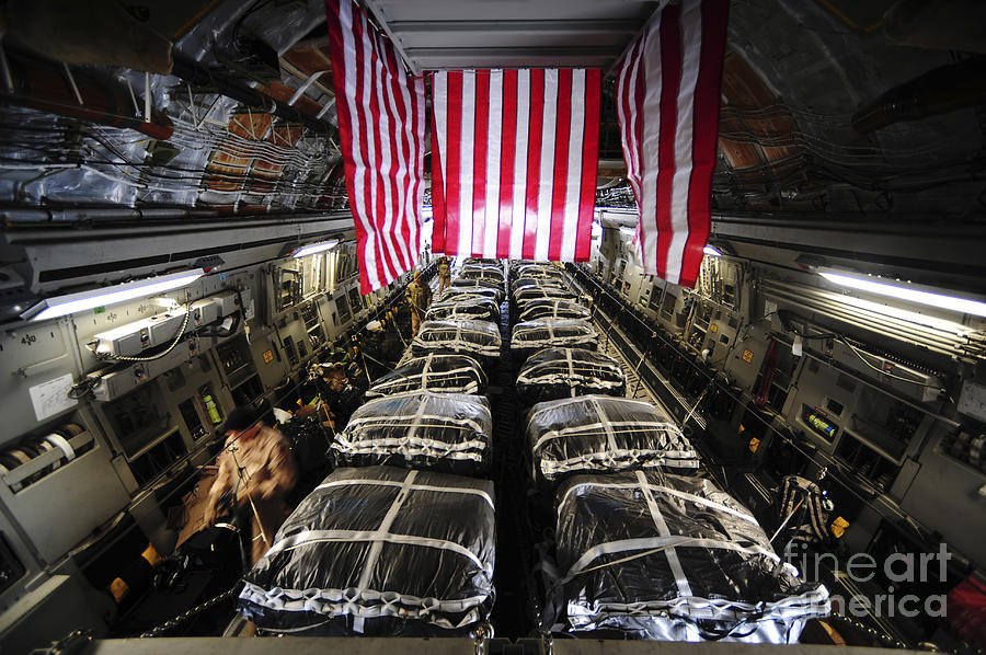 Pallets Of Cargo Inside Of A C-17 Photograph by Stocktrek Images
