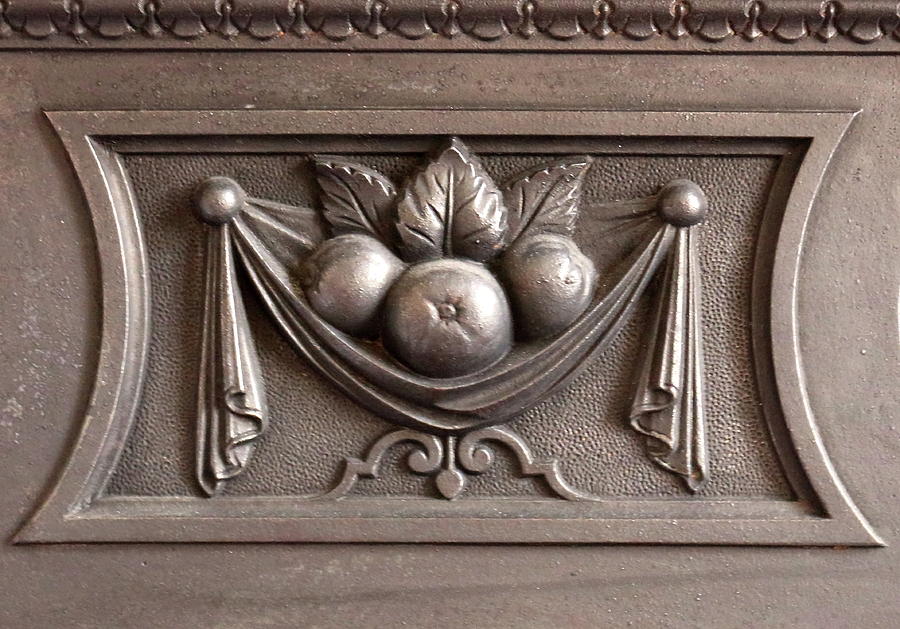 Panel in a Victorian Fireplace Photograph by Jeff Townsend