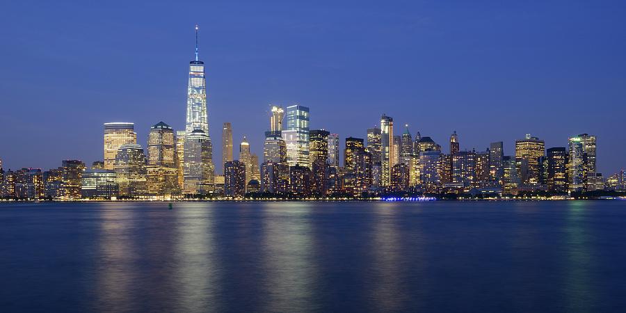 Panorama Lower Manhattan skyline at night with One World Trade Center Photograph by Merijn Van der Vliet