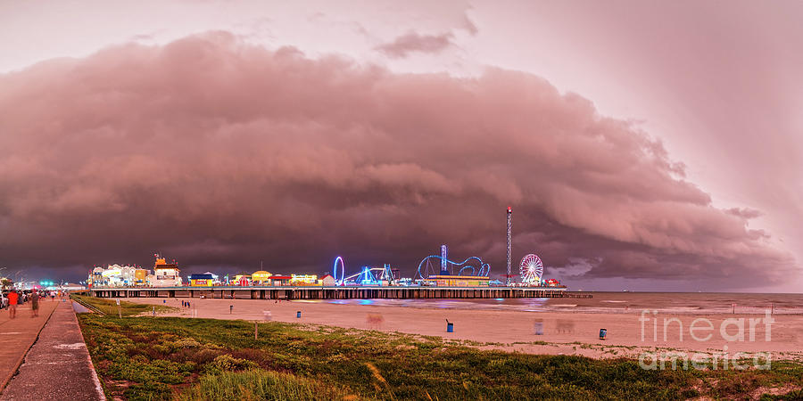 Panorama of Historic Galveston Pleasure Pier with Approaching Storm Above Galveston Seawall Texas Photograph by Silvio Ligutti