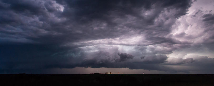 Panorama of lightning illuminating a nocturnal beast Photograph by Tony ...