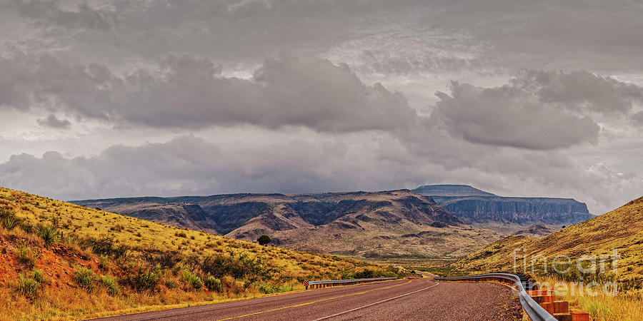 Panorama of Stormy Weather Over Wild Rose Pass in the Davis Mountains - Jeff Davis County West Texas Photograph by Silvio Ligutti