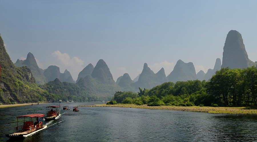 Panorama of tour boat rafts on the Li river Guangxi China with f ...