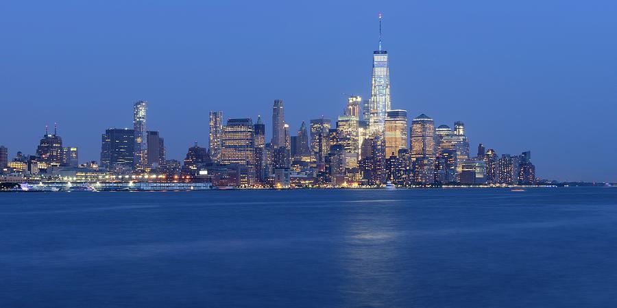 Panorama skyline Lower Manhattan in the evening seen from New Jersey Photograph by Merijn Van der Vliet
