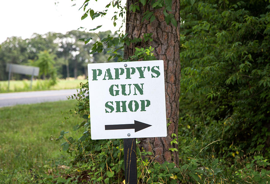 Pappys Gun Shop Photograph by Charles Hite