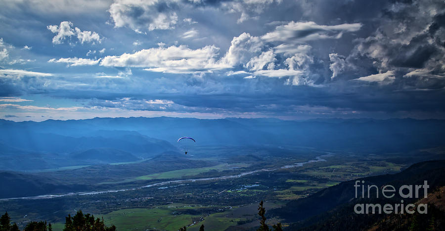 Paragliding above Jackson Hole Photograph by Bruce Block