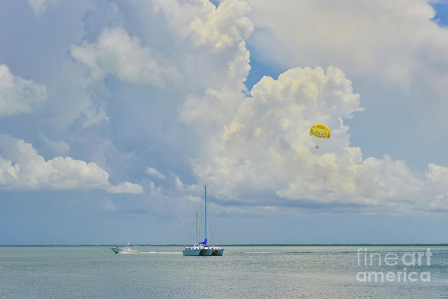 Parasailing in Key Largo Photograph by Olga Hamilton