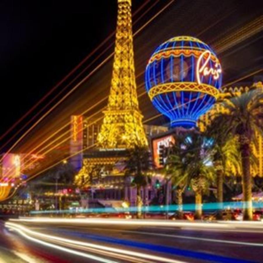 Lasvegas Photograph - Paris Las Vegas Strip Light Show - by Susan Candelario