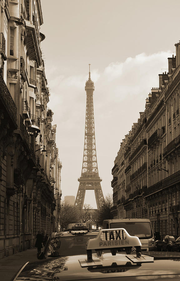 Parisian Taxi Cabs and Eiffel Tower framed by Paris Architecture Sepia Photograph by Shawn OBrien