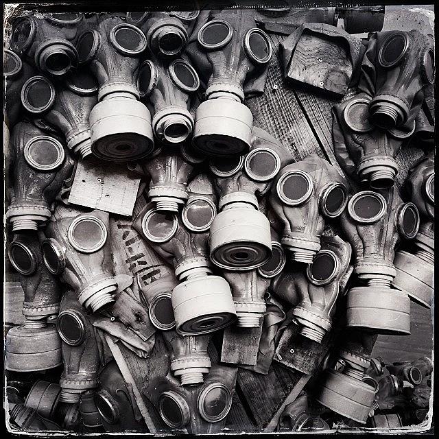Bw Photograph - Part Of 400 Gas Masks An Installation by Valentina Petrova