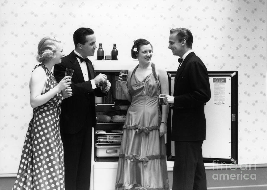 Party Guests At Refrigerator, C.1930-40s Photograph by H. Armstrong Roberts/ClassicStock