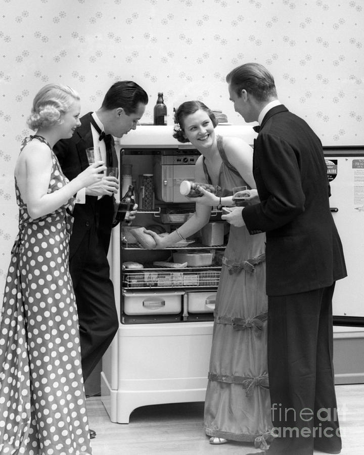 Party Guests At Refrigerator, C.1930s Photograph by H. Armstrong Roberts/ClassicStock