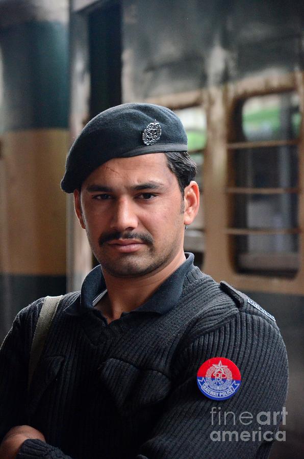 Pashtun Railway Police officer stands guard at train Station Peshawar Pakistan Photograph by Imran Ahmed