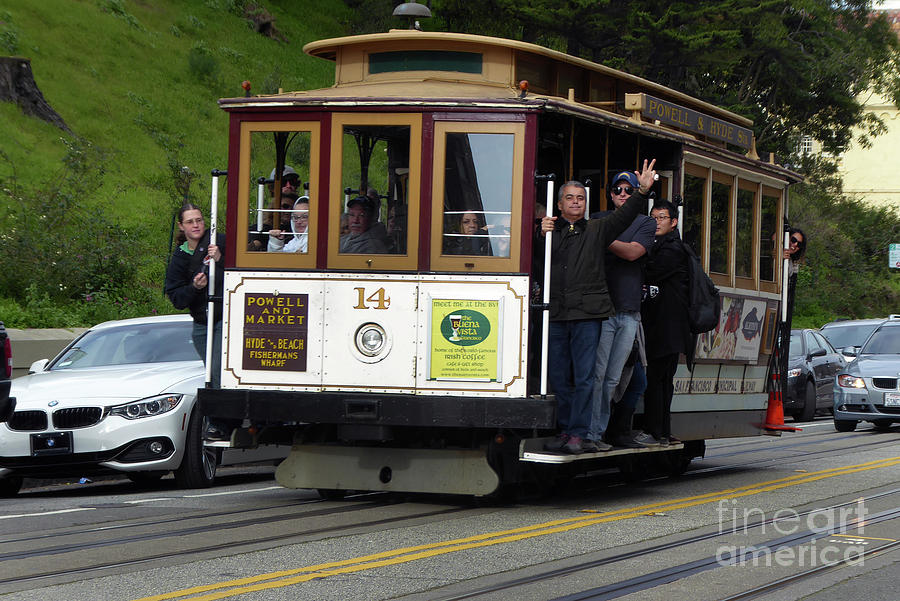 Passenger waves from a Cable Car Photograph by Steven Spak