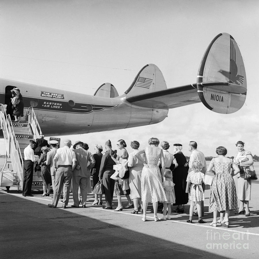Passengers Boarding A Plane Photograph by C.S. Bauer/ClassicStock