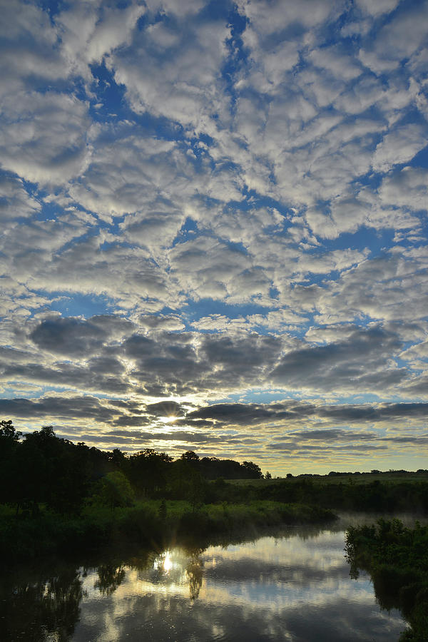 Passing Clouds at Sunrise in Glacial Park Photograph by Ray Mathis
