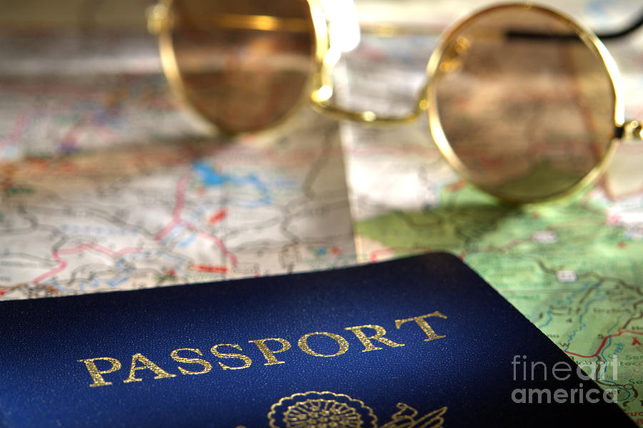 Passport and Sunglasses over Road Travel Map Photograph by Olivier Le Queinec