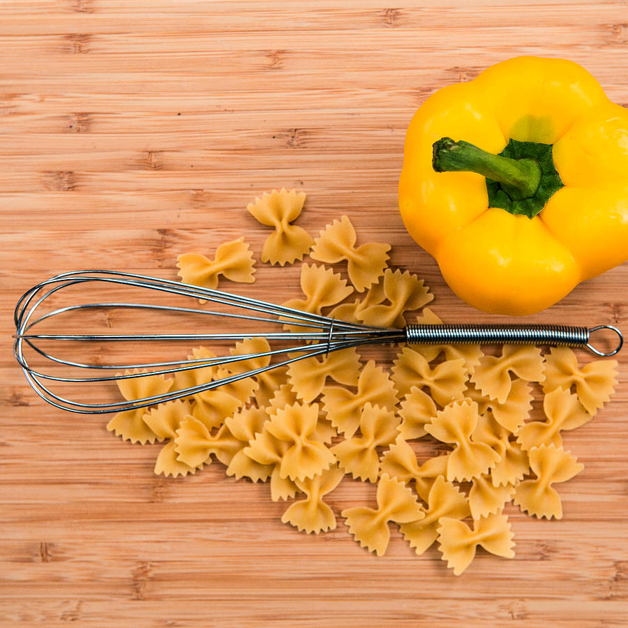 Pasta Yellow Pepper and Whisk Photograph by Rebecca Cozart