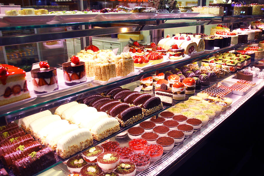 Pastry shop display window with cakes Photograph by Natalia Danchenko